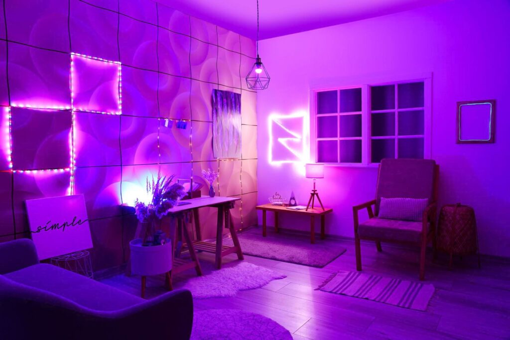 A room lit with pink neon lights